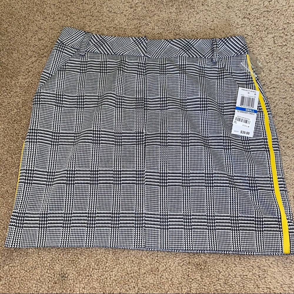 women's plaid skirt with yellow stripe.